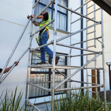 industrial-construction-handyman-using-screwdriver-S-1